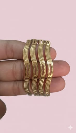 Rudraaksha Gold Plated Wavy Textured Bangles (Set of 4)